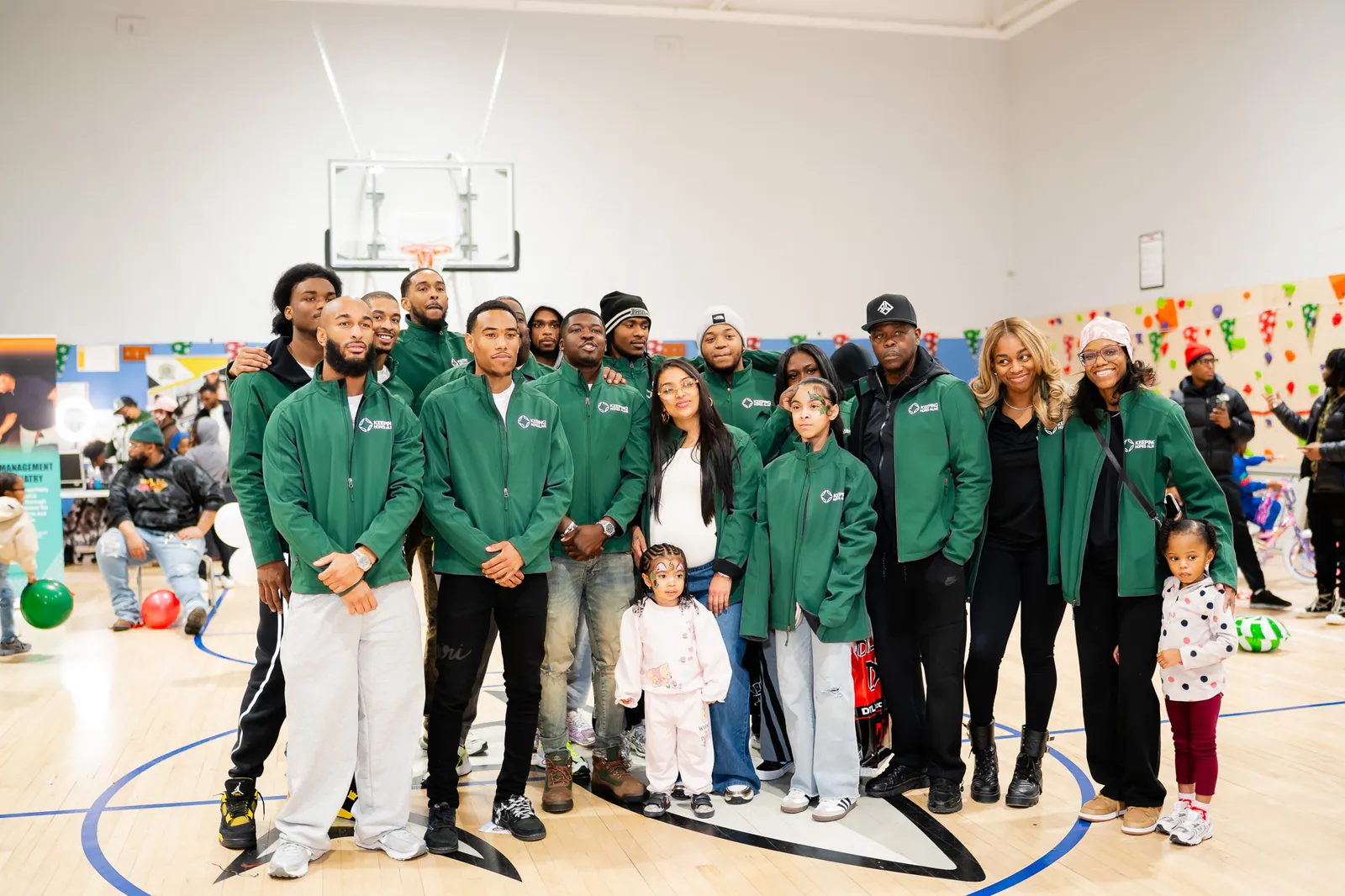 Keeping Hopes Alive staff and volunteers in KHA jackets at a Baltimore community event