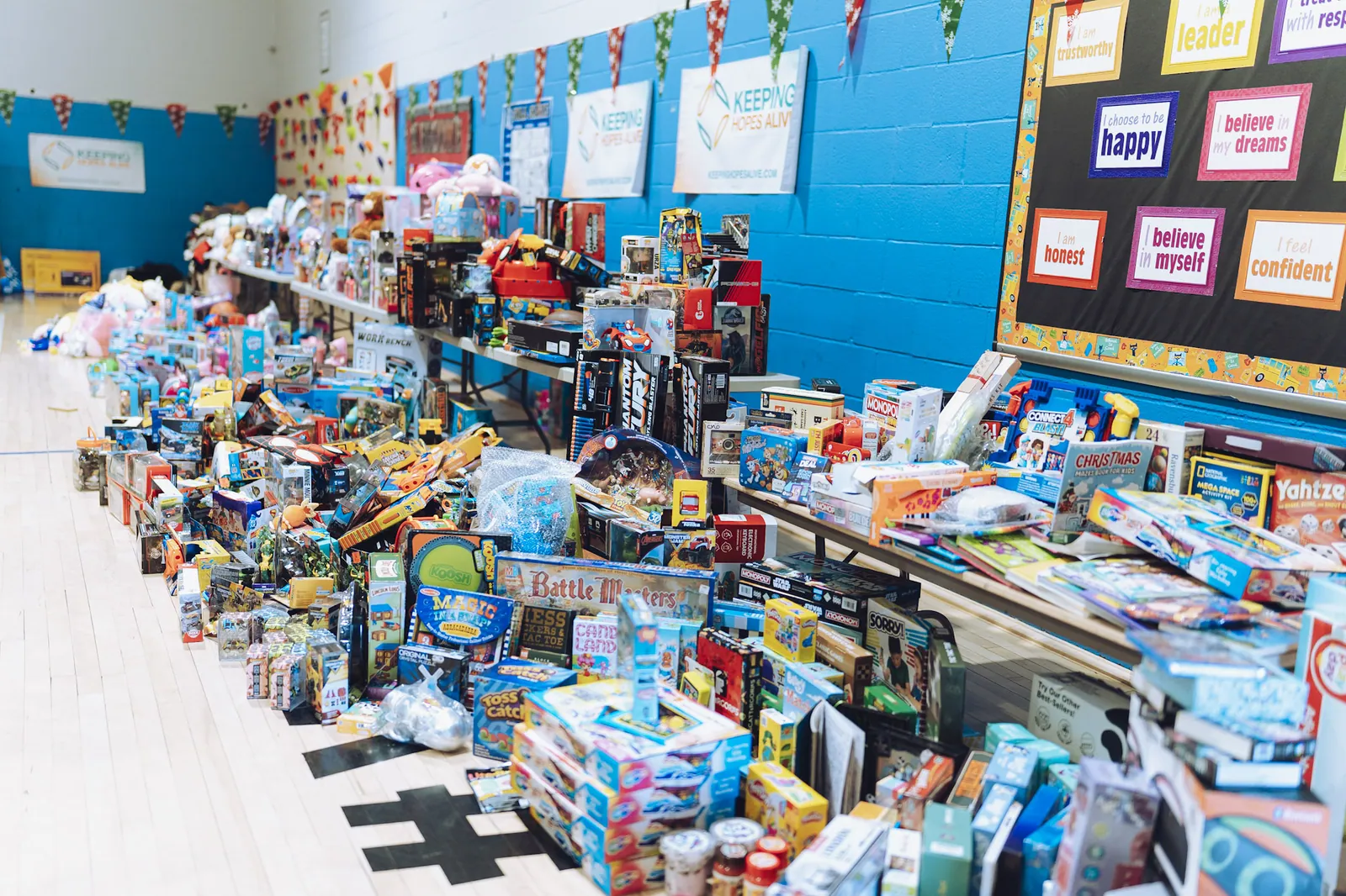 Rows of donated toys ready for families at the KHA holiday drive